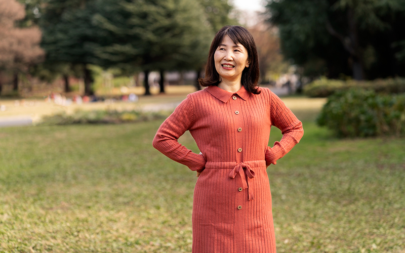 Healthy woman enjoying post-menopause life after TCM acupuncture treatment.